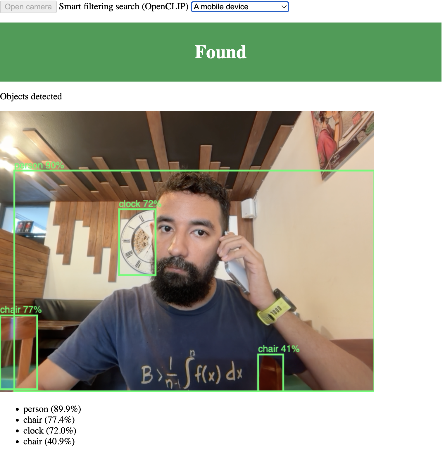 YOLO and OpenCLIP detect a person with a phone